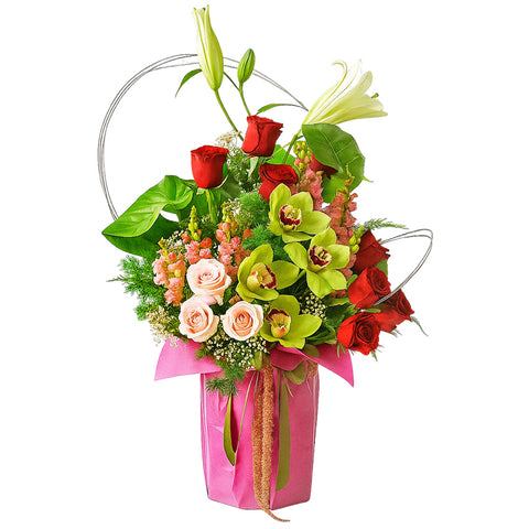Arrangement Of White Lilies Red Roses Pink Roses Cymbidium And Fillers in Vase