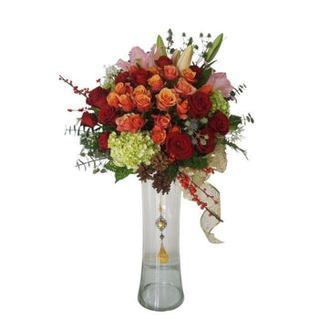 Arrangement Of Lilies Red Roses Cherry Brandy Rose in Vase